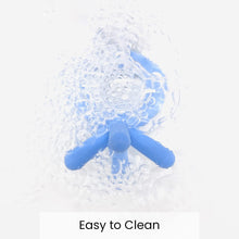 Blue silicone baby teether shown with water bubbles for cleaning