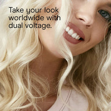 Styled long blonde curls with soft waves from curling iron