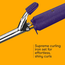 Curling iron with purple barrel and bristle-like guard, black power cord.