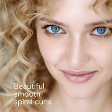Blonde smooth spiral curls with glossy, defined ringlets.