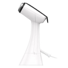 White garment steamer with black nozzle ring and cord, tilted for steaming