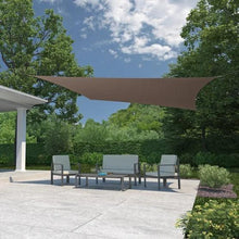 Gray rectangle shade sail stretched overhead on patio