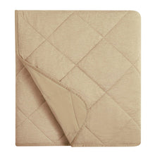 Beige cooling blanket folded square, showing quilted diamond stitching and edge trim