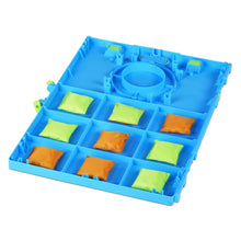 Blue cornhole game tray with center ring and square compartments holding bean bags