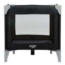Portable baby play yard with black mesh panels and padded bottom, dot-pattern fabric