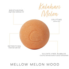 Round orange bath bomb with swirl detail, kids bath branding on package card