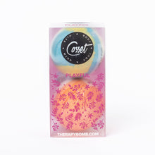 Kids bubble bath bomb in purple box with blue round bomb graphic, playful floral design