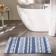 Blue striped cotton bath mat with textured pile, rectangular