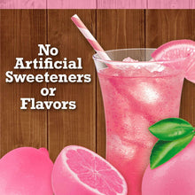 Pink lemonade beverage in a glass with straw and lemon slice and leaf garnish