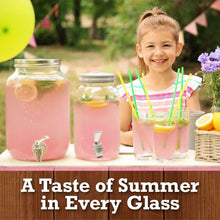 Pink lemonade drink jars and glasses with paper straws for a summer-style beverage