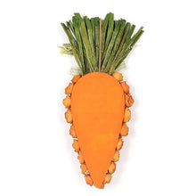 Carrot swag decoration with orange carrot body and green leafy top, tied with ribbon