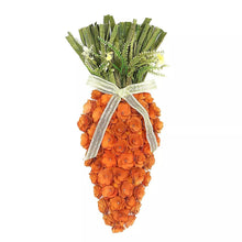 Carrot swag decoration with orange scalloped carrot and green leaf top, tied with ribbon