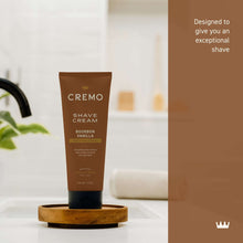Cremo shave cream tube on wooden stand, Bourbon Vanilla, brown with black base