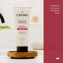 CREMO shave cream tube on round wooden base with black cap