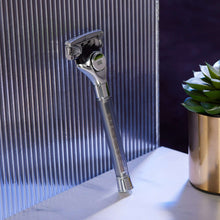 Upright razor with blade head and glossy metal handle
