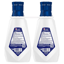 Crest 3D White Strength whitening mouthwash bottles with blue caps, Clean Mint (2 pk)