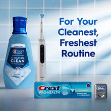 Crest Complete Clean alcohol-free clean mint mouthwash bottle with oral care items