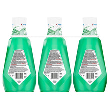 Three Crest Scope Outlast mouthwash bottles, green backs with barcode and directions