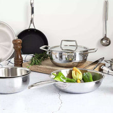 Nonstick crêpe pan with dark interior surface on kitchen countertop