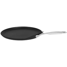 Nonstick crêpe pan with dark skillet surface and polished metal handle