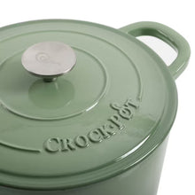 Pistachio green dutch oven lid with knob and embossed “Crock-Pot” logo