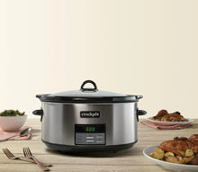 Black stainless 8-quart slow cooker with lid handle and digital timer panel