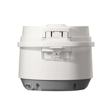 White rice cooker lid removed, showing inner steam parts and heating base