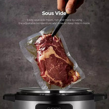 Pressure cooker with sous vide setup using a vacuum-sealed meat bag