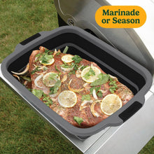 Cuisinart expandable prep and serve tub with marinated meat on the grill surface