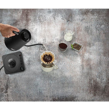 Cuisinart digital gooseneck kettle pouring from gooseneck spout, dark gray