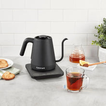 Cuisinart digital gooseneck kettle on counter, matte black, with warming base controls