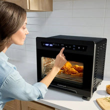 Cuisinart digital air fryer oven with open door and glowing heating elements
