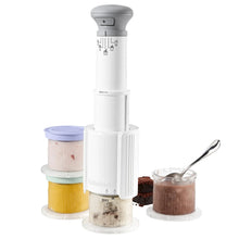 White ice cream maker with silver top and four half-pint cups with lids