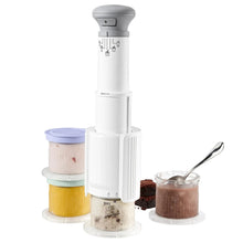 Cuisinart ice cream maker with four half-pint frozen treat cups and spoon