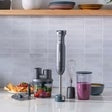 Immersion blender and chopper components on a kitchen counter