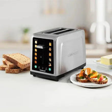 Cuisinart SimpliTouch XL 2-slice touchscreen toaster on countertop with food items