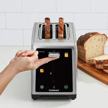 Cuisinart SimpliTouch XL 2-slice touchscreen toaster, loading with bread slices