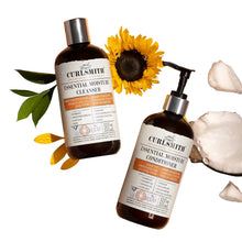 Angled hair moisture cleanser and conditioner bottles with pumps, amber and white labels