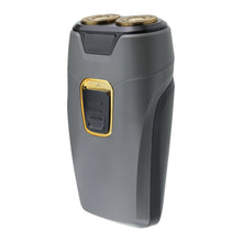 Dual rotary travel shaver side view, dark gray body with gold power switch