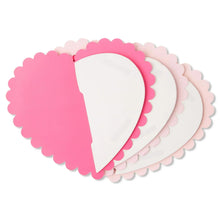 Pink honeycomb heart dangler with scalloped edge and folded fan texture