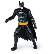 Batman action figure with black armor suit, blue glowing chest pattern, yellow belt