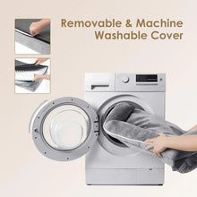 Grey dog bed cover being removed and washed, shown beside a front-loading washer