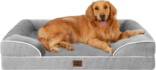 Grey dog couch bed with raised sides, golden retriever relaxing on top