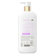 Back of body wash bottle with gold pump showing barcode and ingredient information