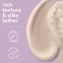 Creamy white lather with small bubbles on a curved surface
