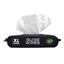 Black XL flushable wipes pack with open top showing white wipes; plant fibers badge.