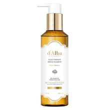 Scalp therapy serum shampoo bottle with gold pump, amber and white label