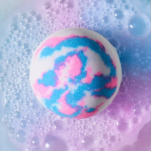 Unicorn bath bomb in bubbles with blue and pink swirl surface