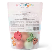Mini bath bomb pouch back panel with ingredient list and small fruit icons.