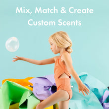 Child beside colorful packaging for custom-scent mini bath bombs